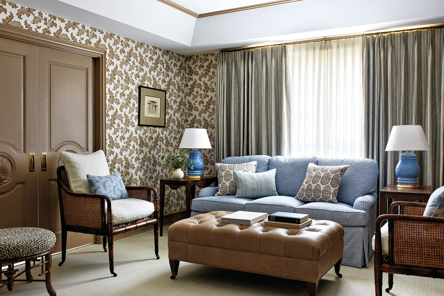 room with patterned wallpaper, blue...
