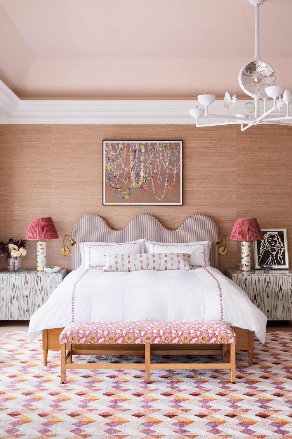 Pink Barbiecore interior design bedroom with a wave-shape headboard