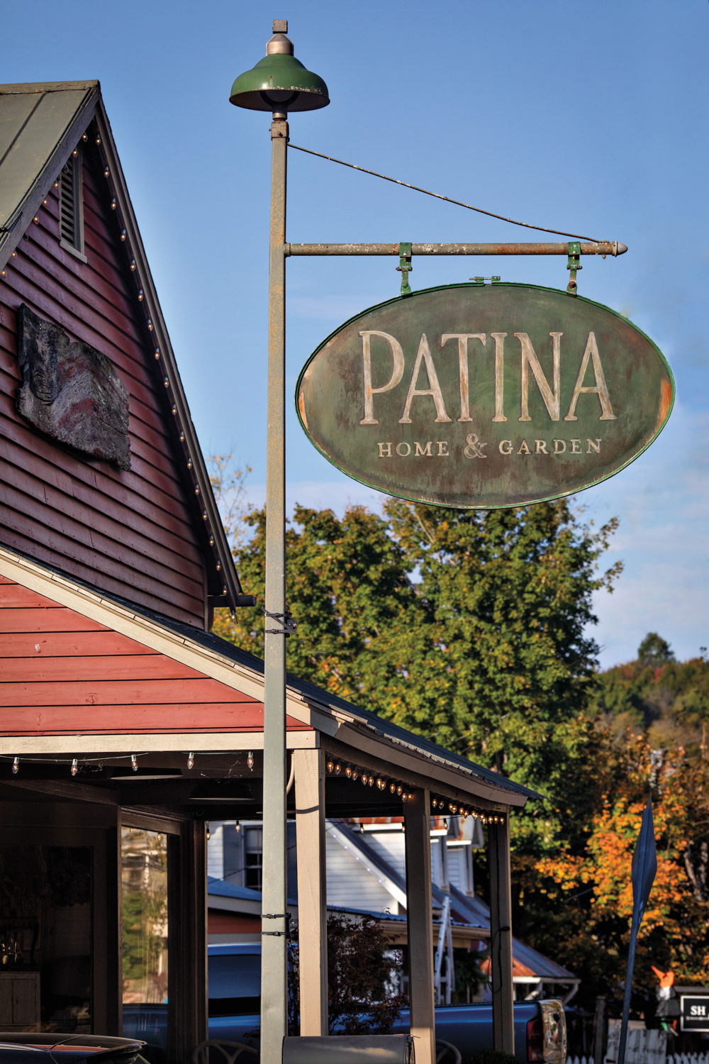 Patinated antique shop sign for Patina Home & Garden