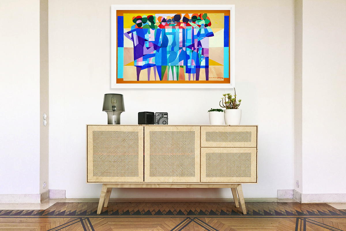 colorful abstract artwork above tan cabinet with lamp and plants