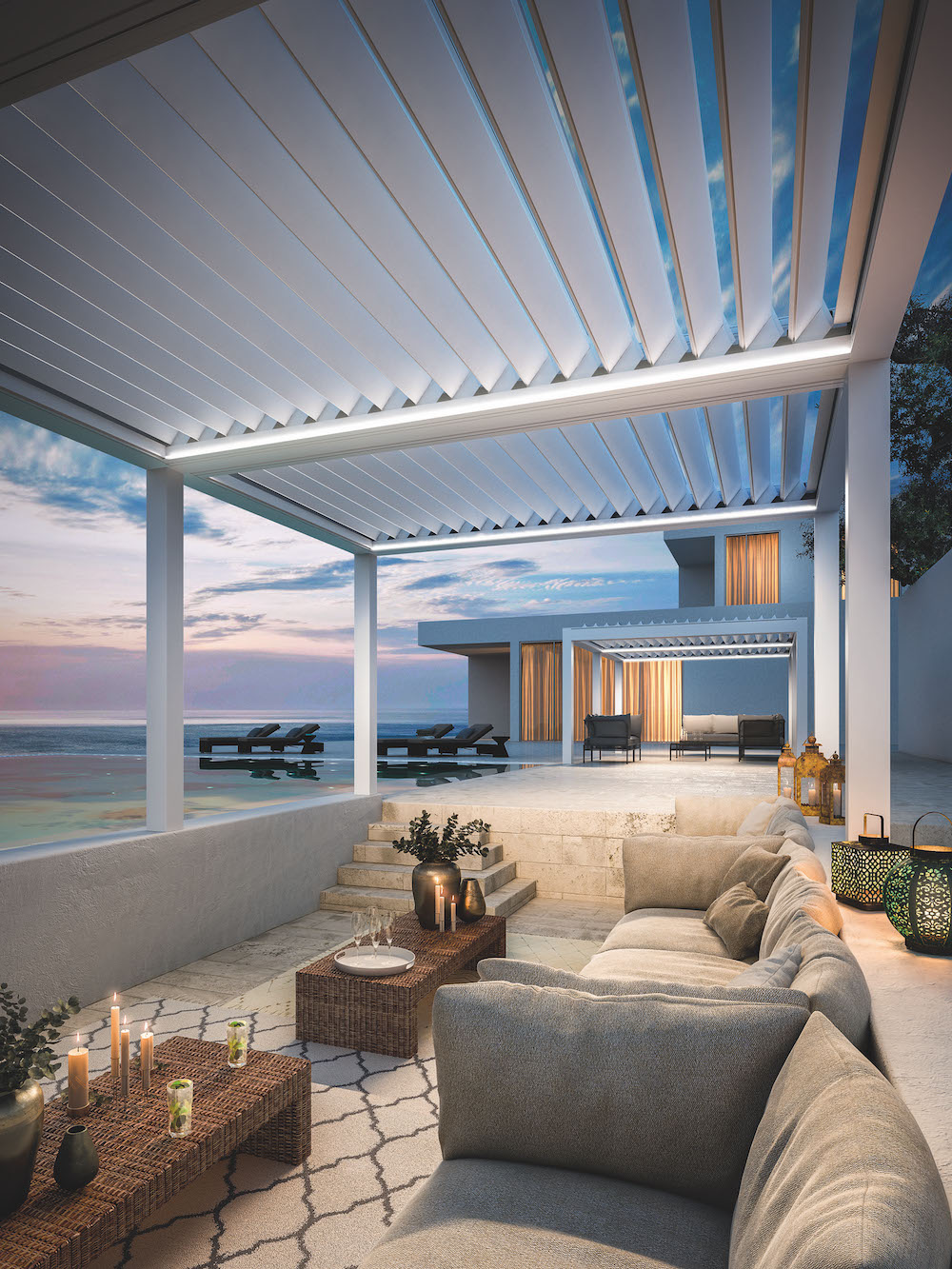 modern home with motorized pergola, outdoor furniture and infinity pool overlooking ocean