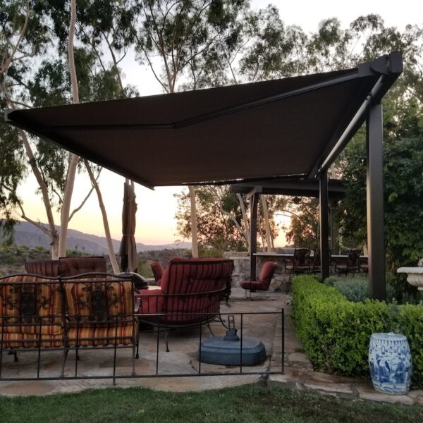 retractable shade structure overlooking vineyard in California