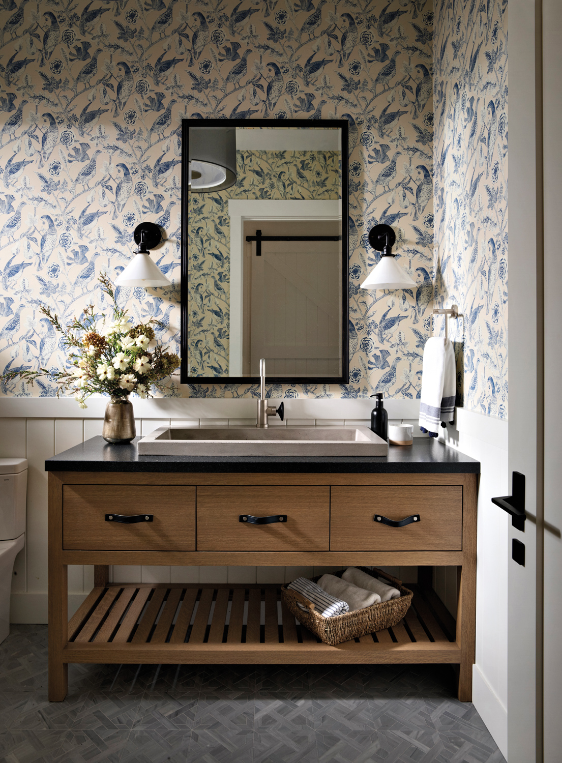nature-inspired wallcovering in powder room...