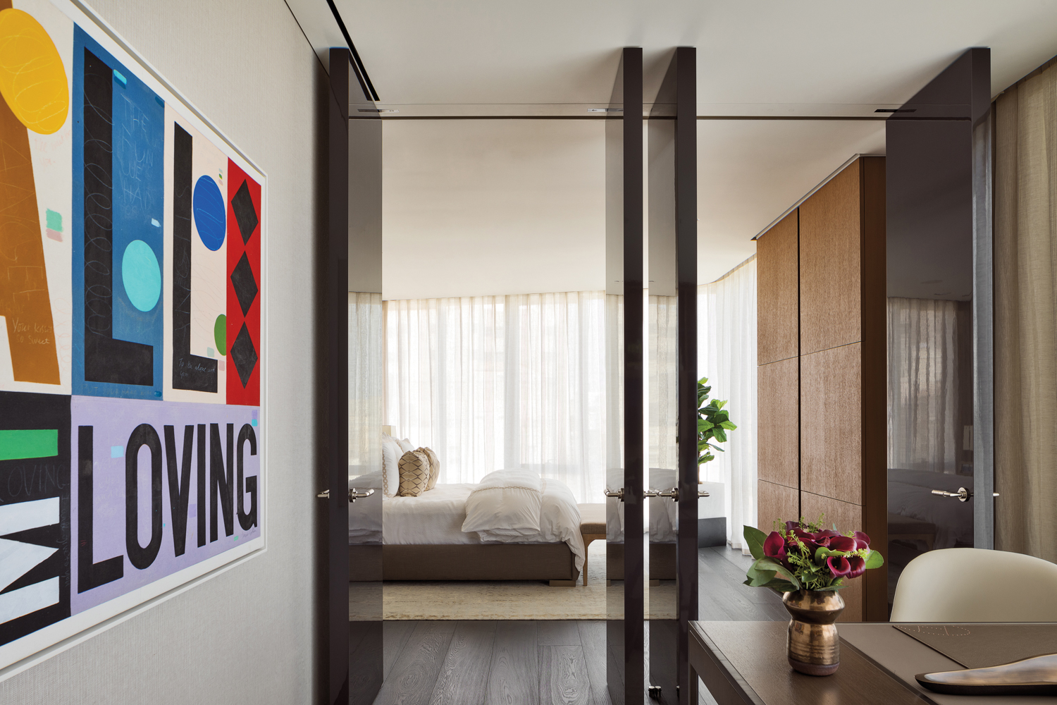 lacquered panels separate bedroom from...