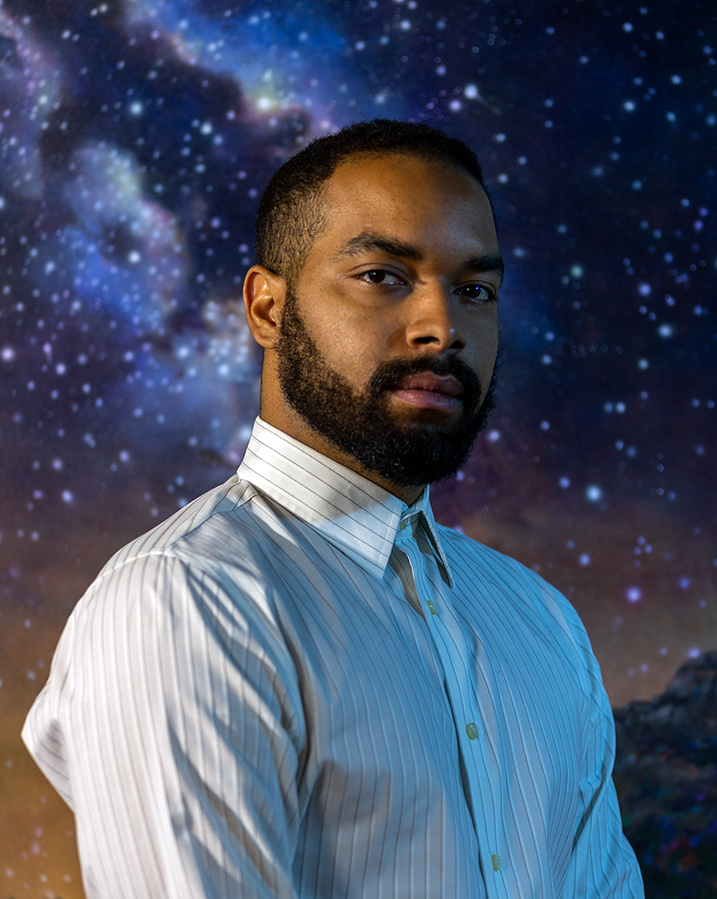 Artist Ryan Runcie against a background of stars for Juneteenth article