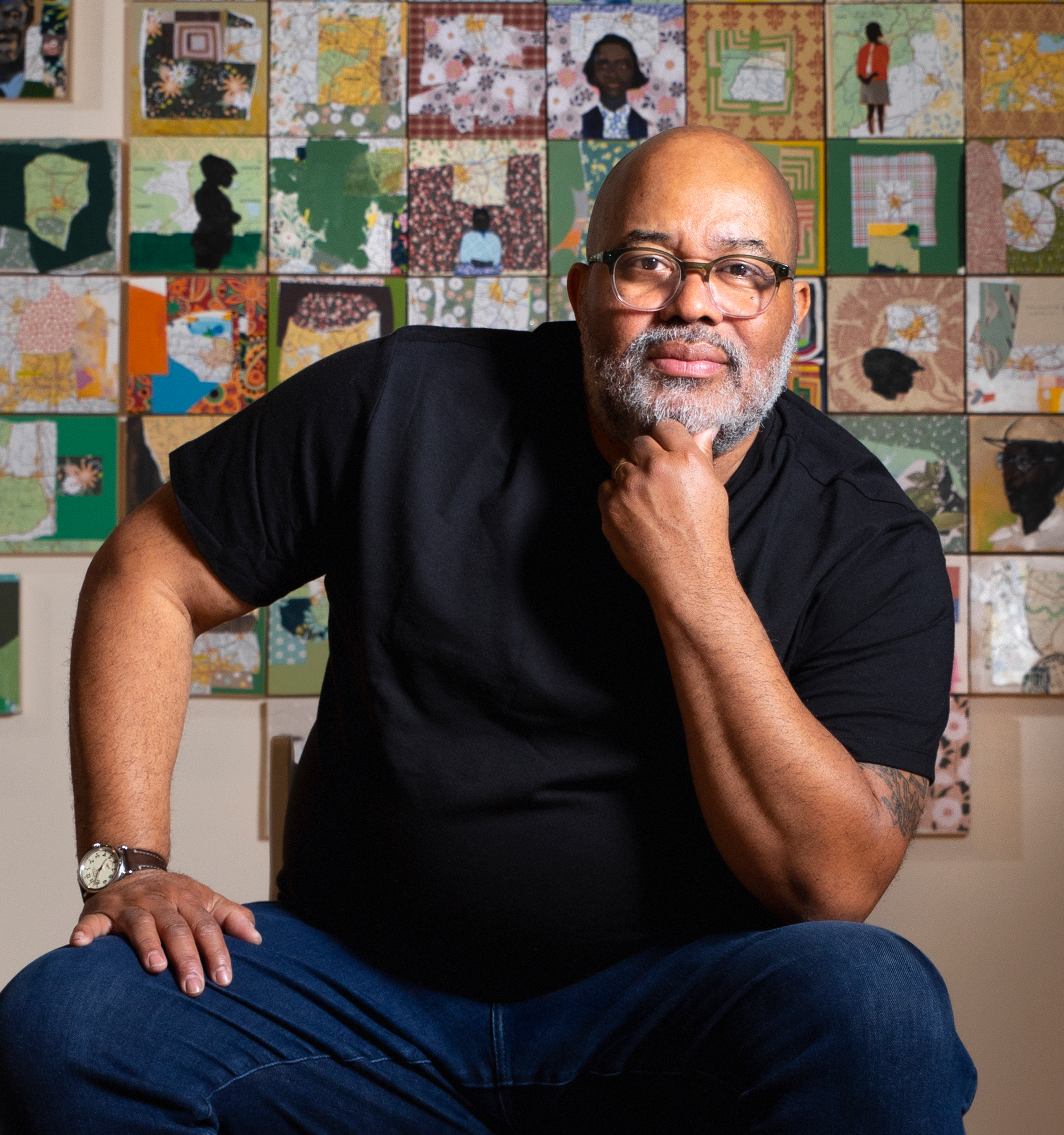 headshot of Ransome in front of his migration collage for Juneteenth article