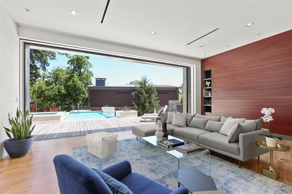 open concept living area to backyard, pocket window doors to allow outside in