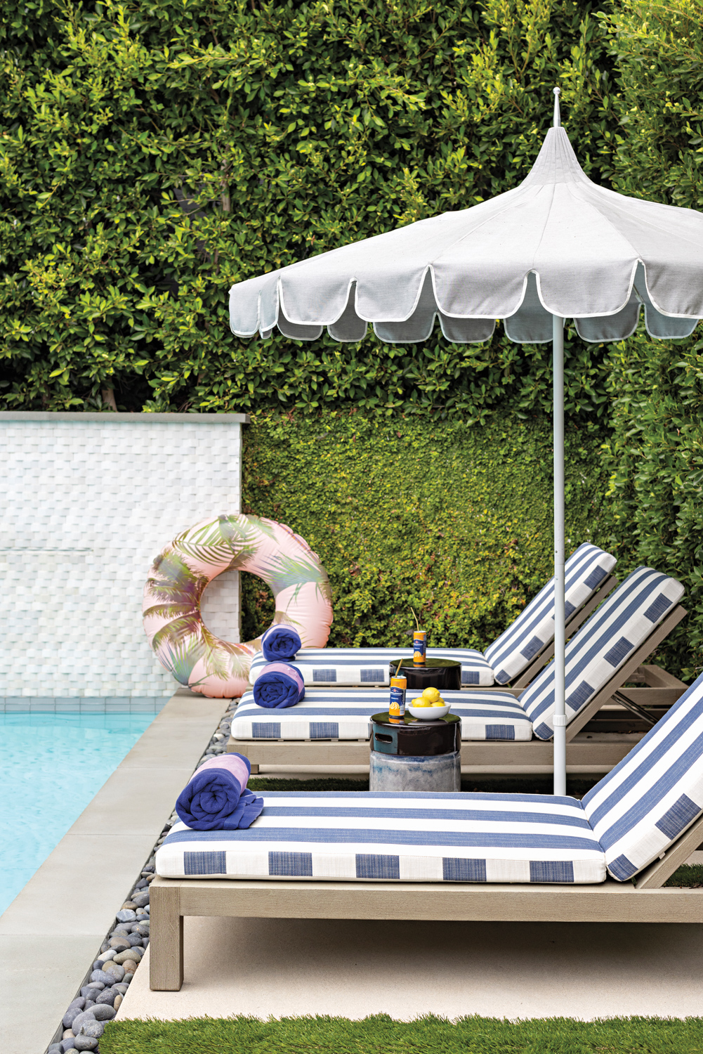 pool deck with scalloped umbrella...