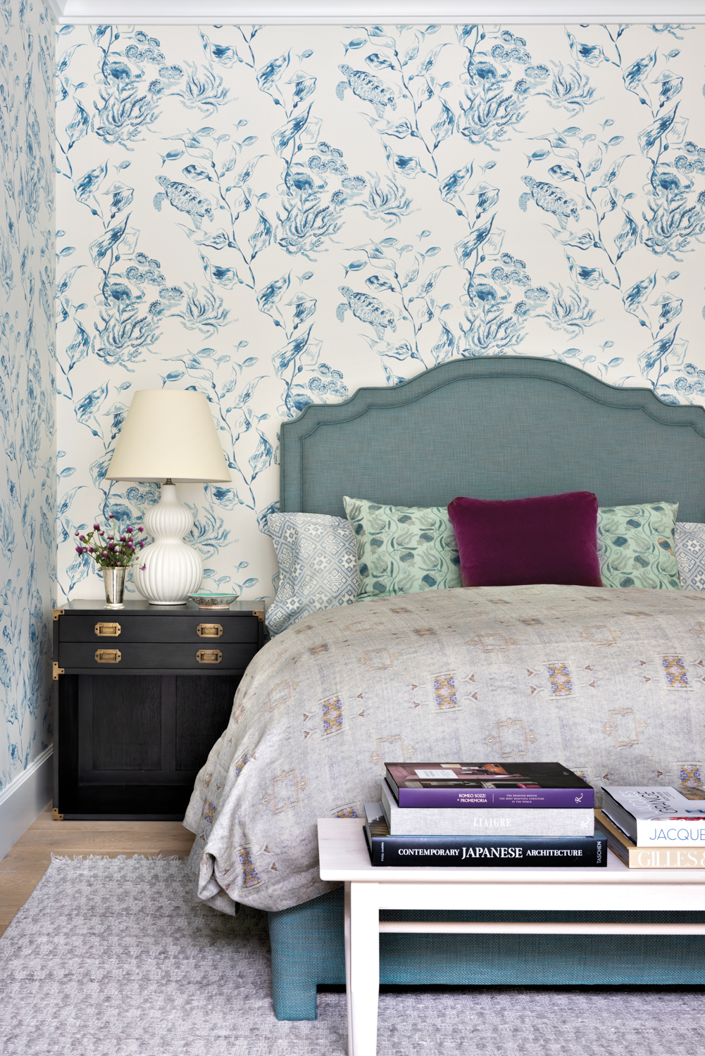guest room with seascape wallpaper,...