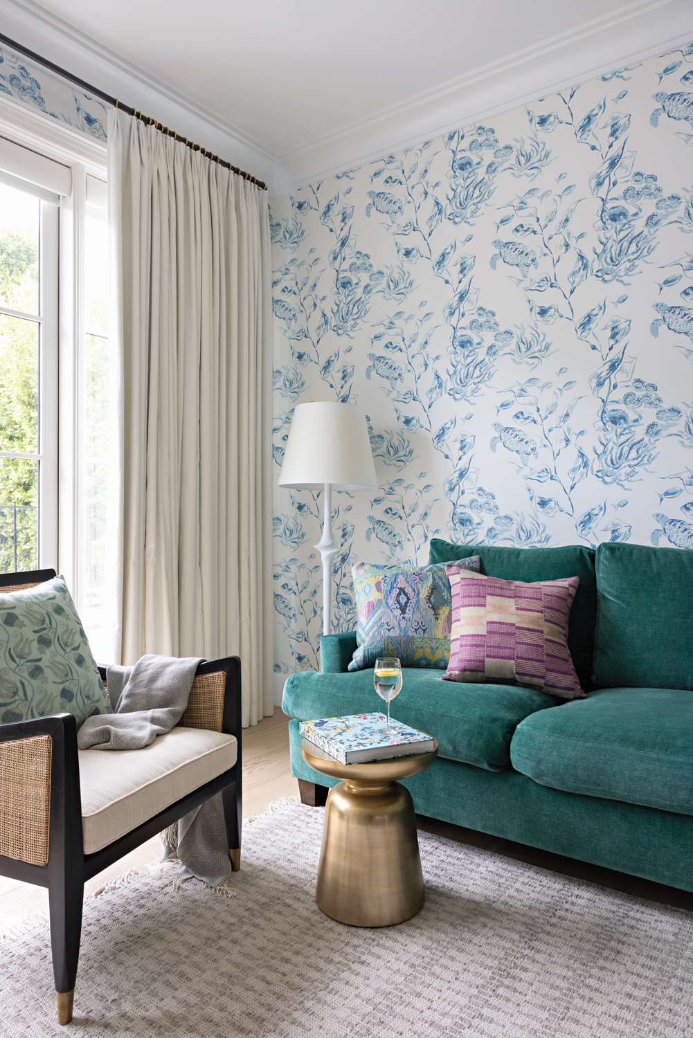 guest room with armchair, teal...