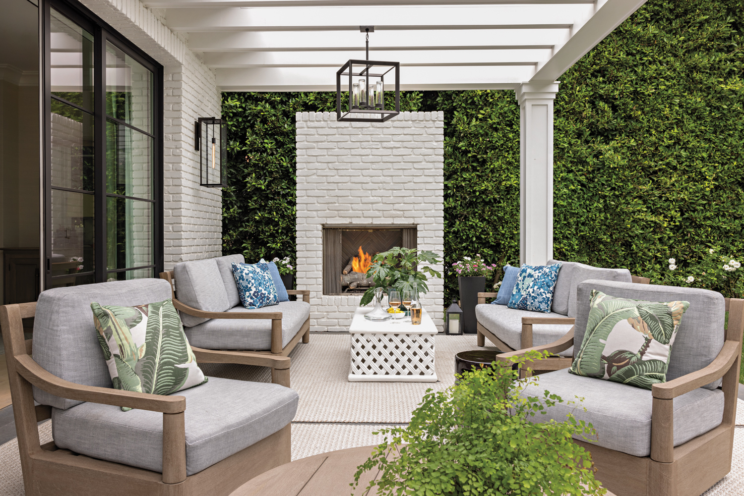 patio with outdoor fireplace, set...