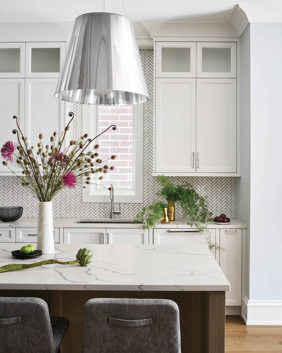 white kitchen with quartz countertops...