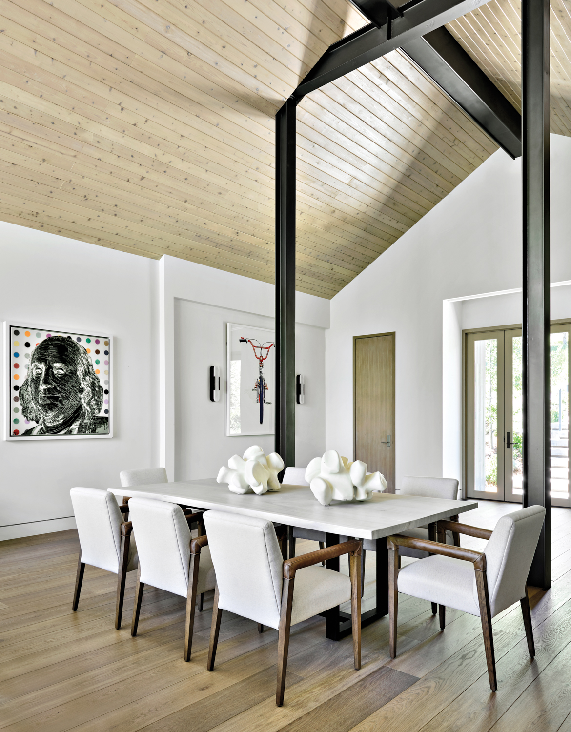 dining area with white table,...