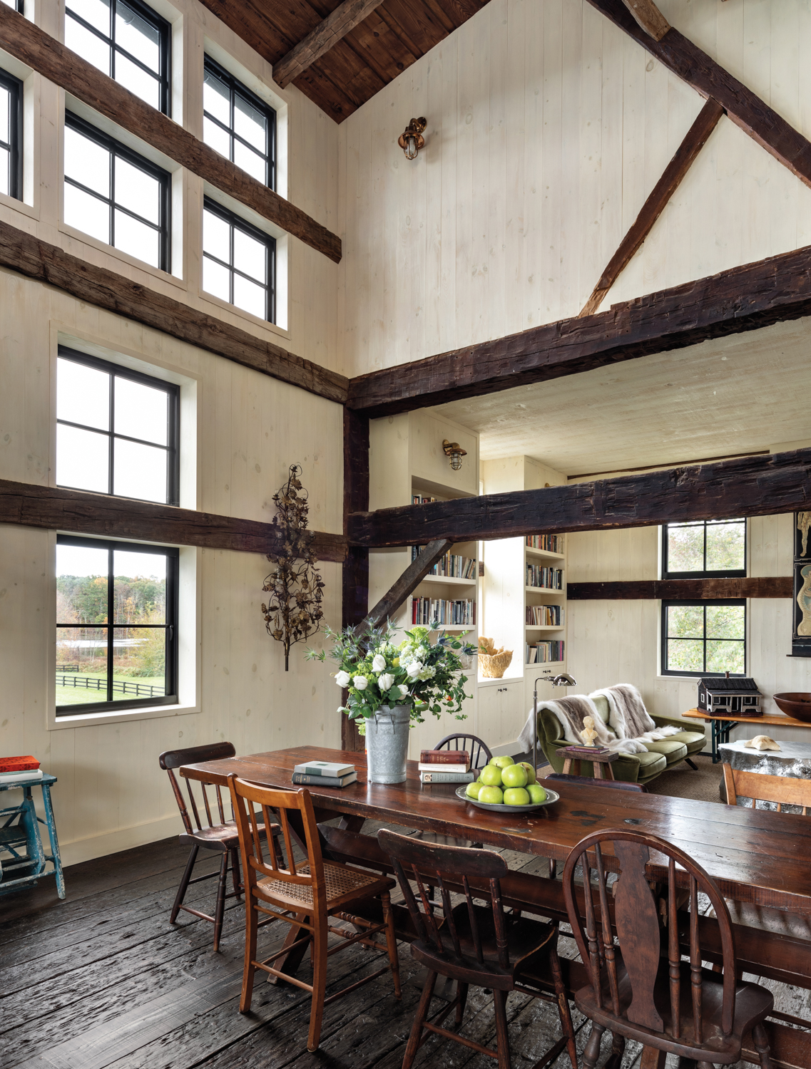 double height dining area with oak beams