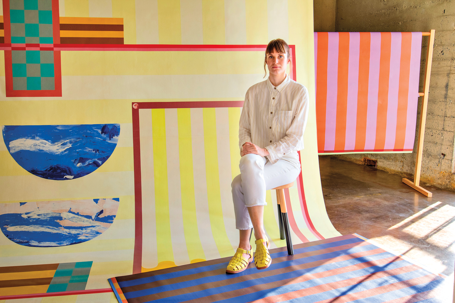 Megan Enright of Studio Teppi with floorcloth textiles