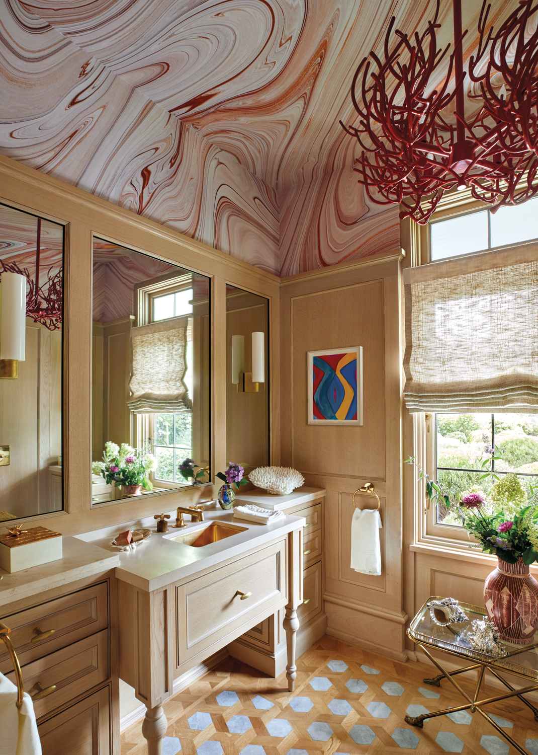 powder room with swirled red...