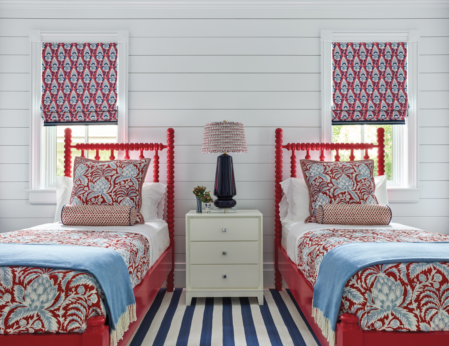 guest bedroom with red twin...