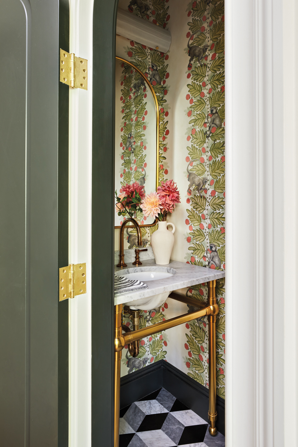 powder room with monkey wallpaper...