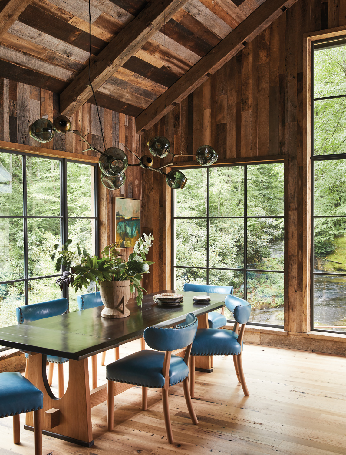 Windowed dining area with blue...