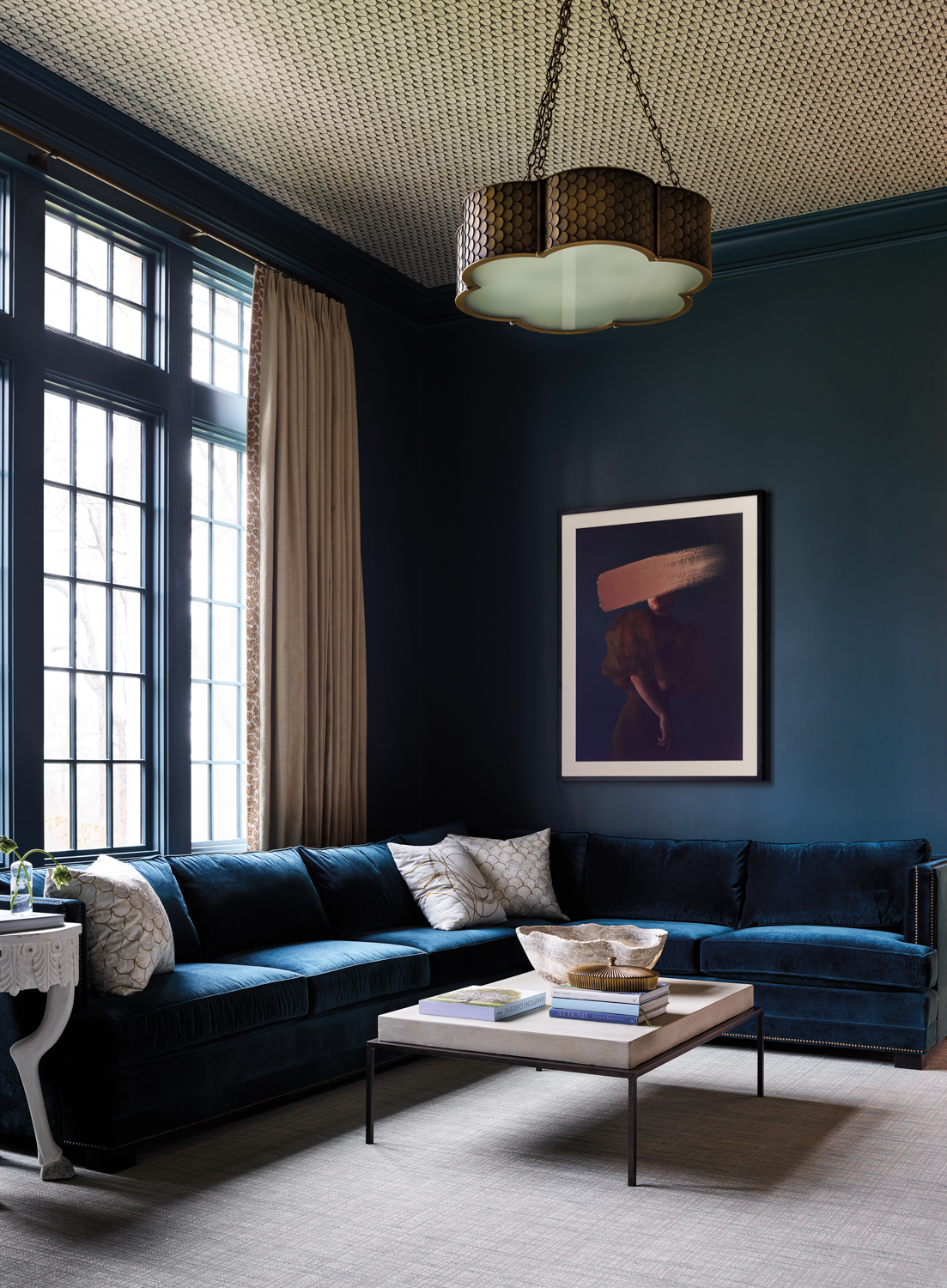 Living room with dark blue...
