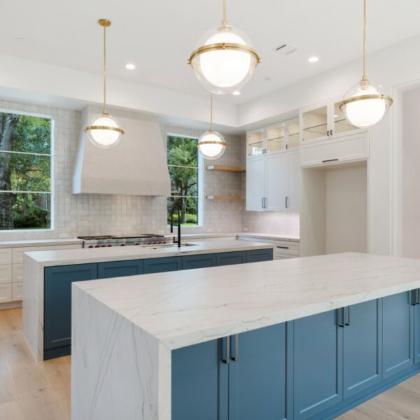 natural kitchen with pops of blue built by home builder in Houston, tx
