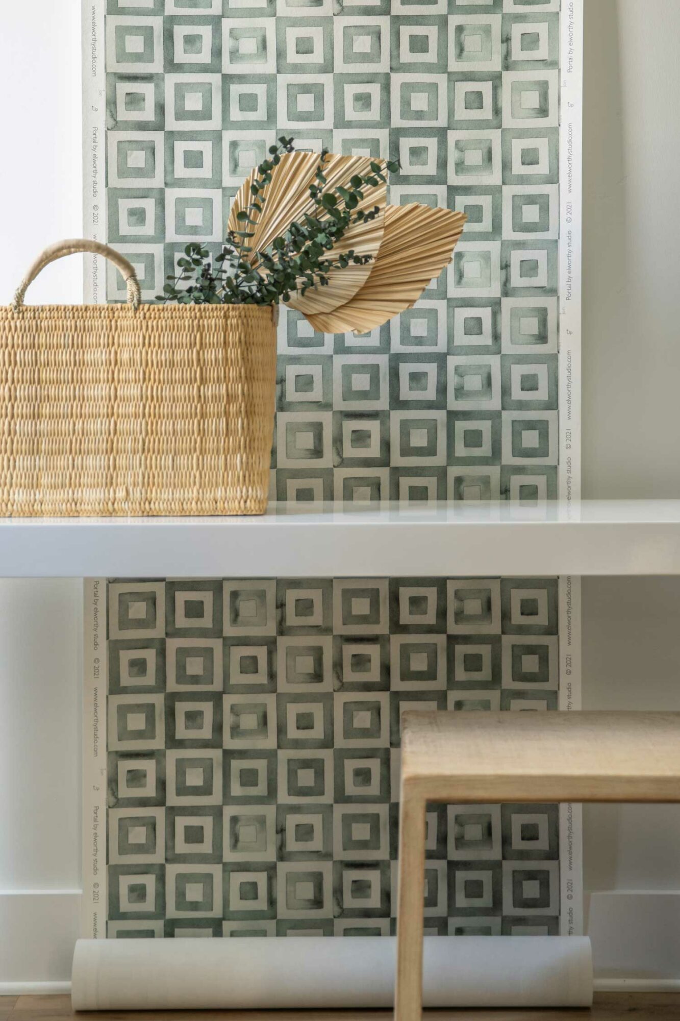 geometric wallpaper behind table