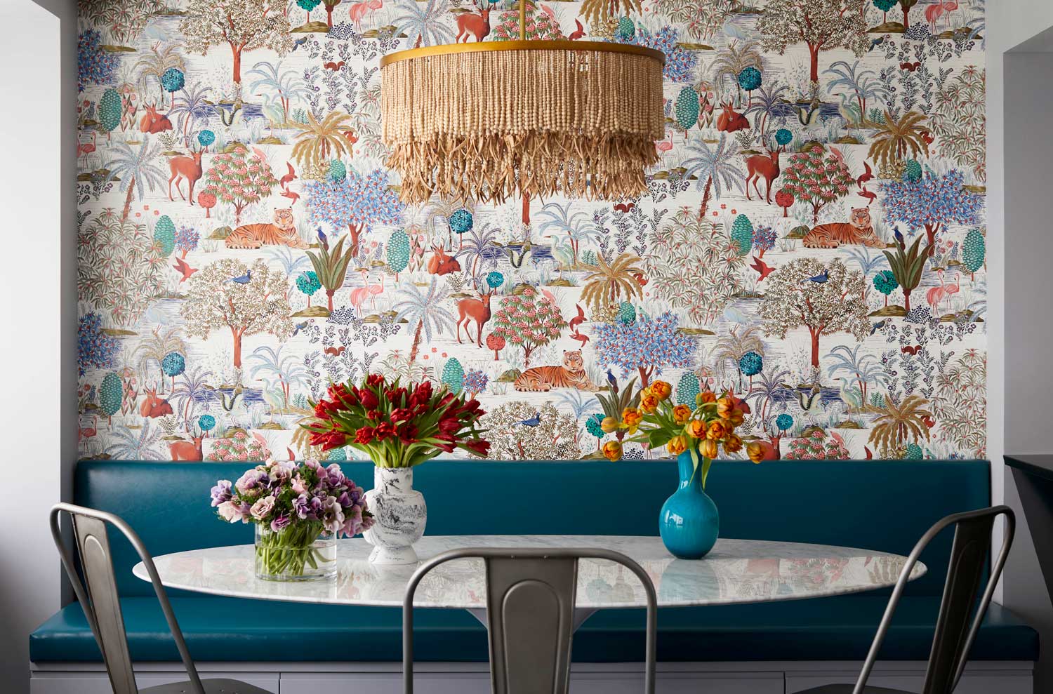 dining nook with one of the 2023 wallpaper trends: an abstract wall mural