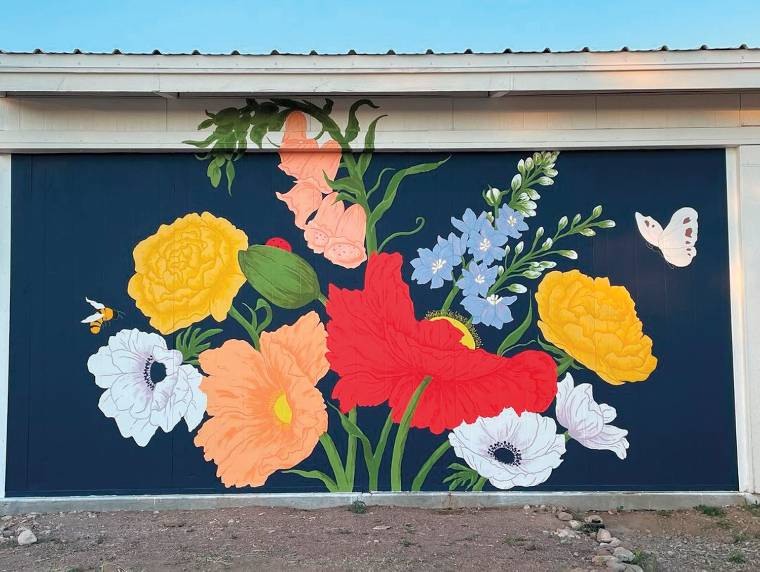 Mural of a bouquet of flowers, a butterfly and a bee
