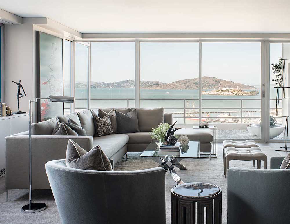 coastal California neutral living room overlooking the Pacific Ocean with panoramic windows