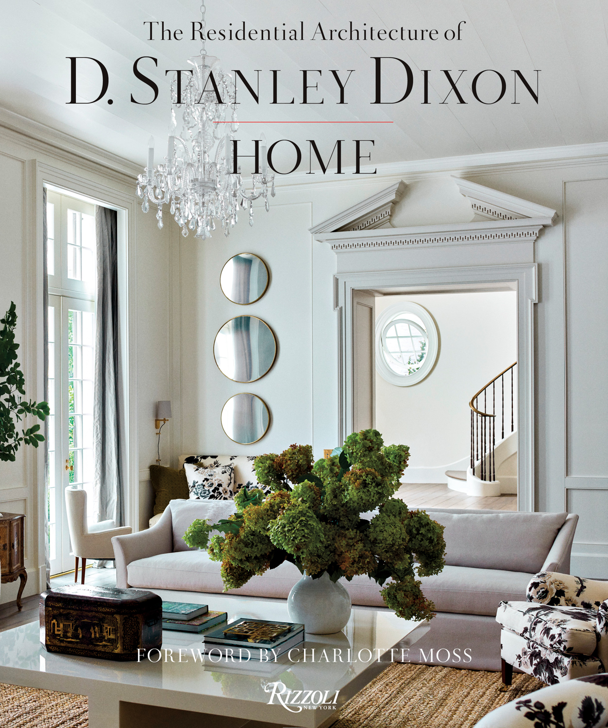 Book cover featuring a white living room with glass chandelier by Stan Dixon