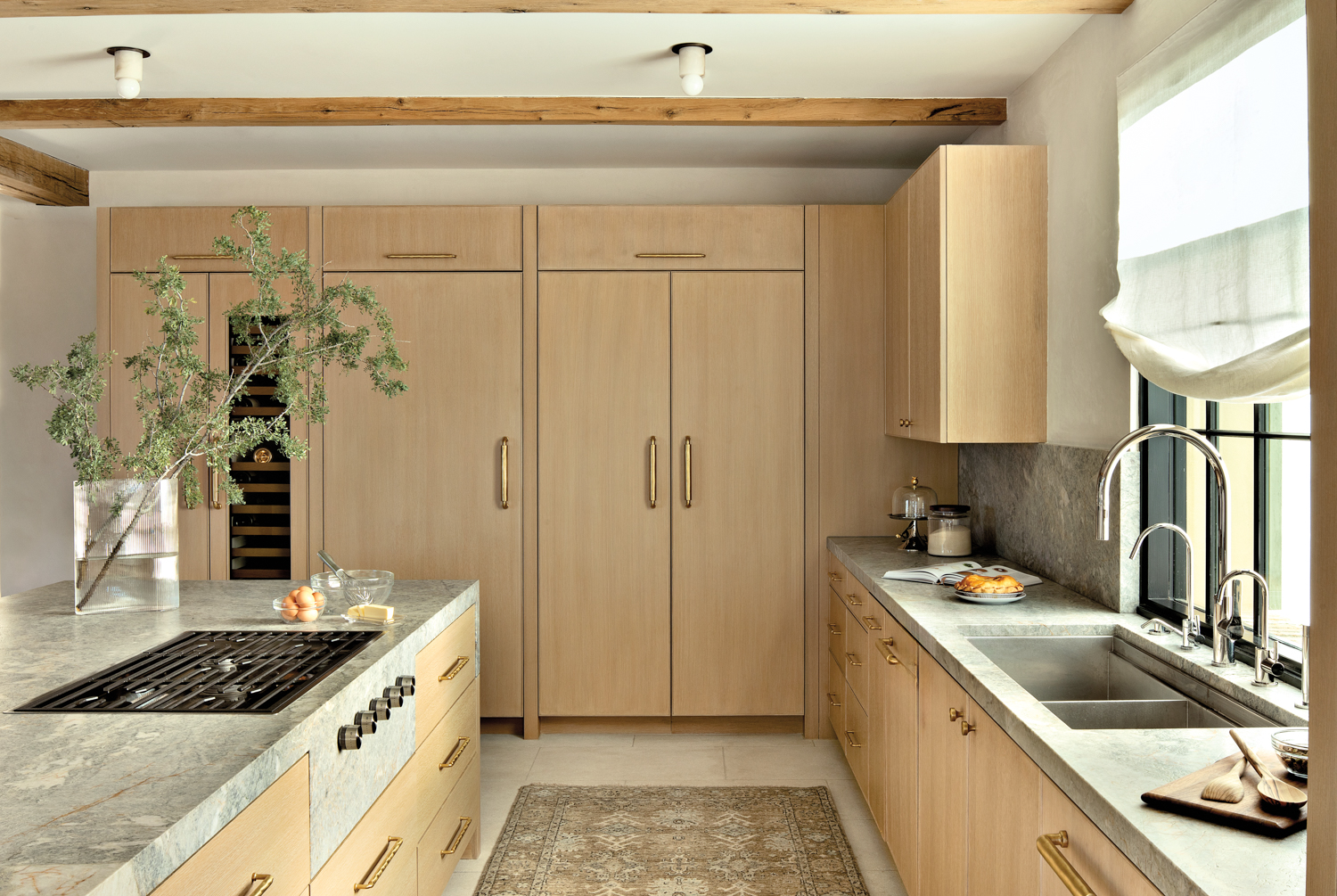 Kitchen with white oak cabinetry...