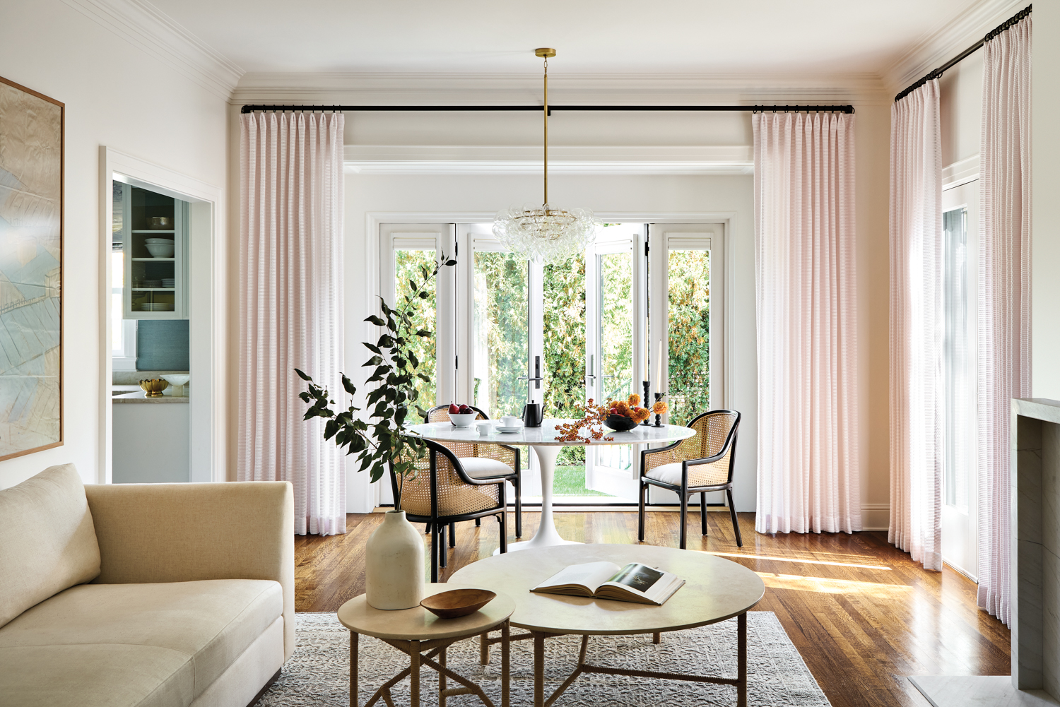 Dining room with pink sheer...