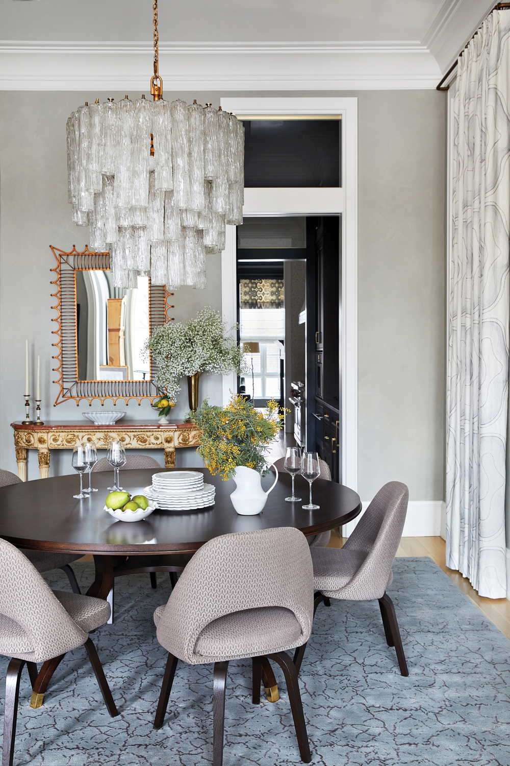 Murano-glass chandelier hangs above a...