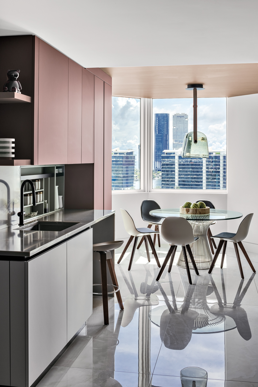 kitchen with burgundy cabinetry and...