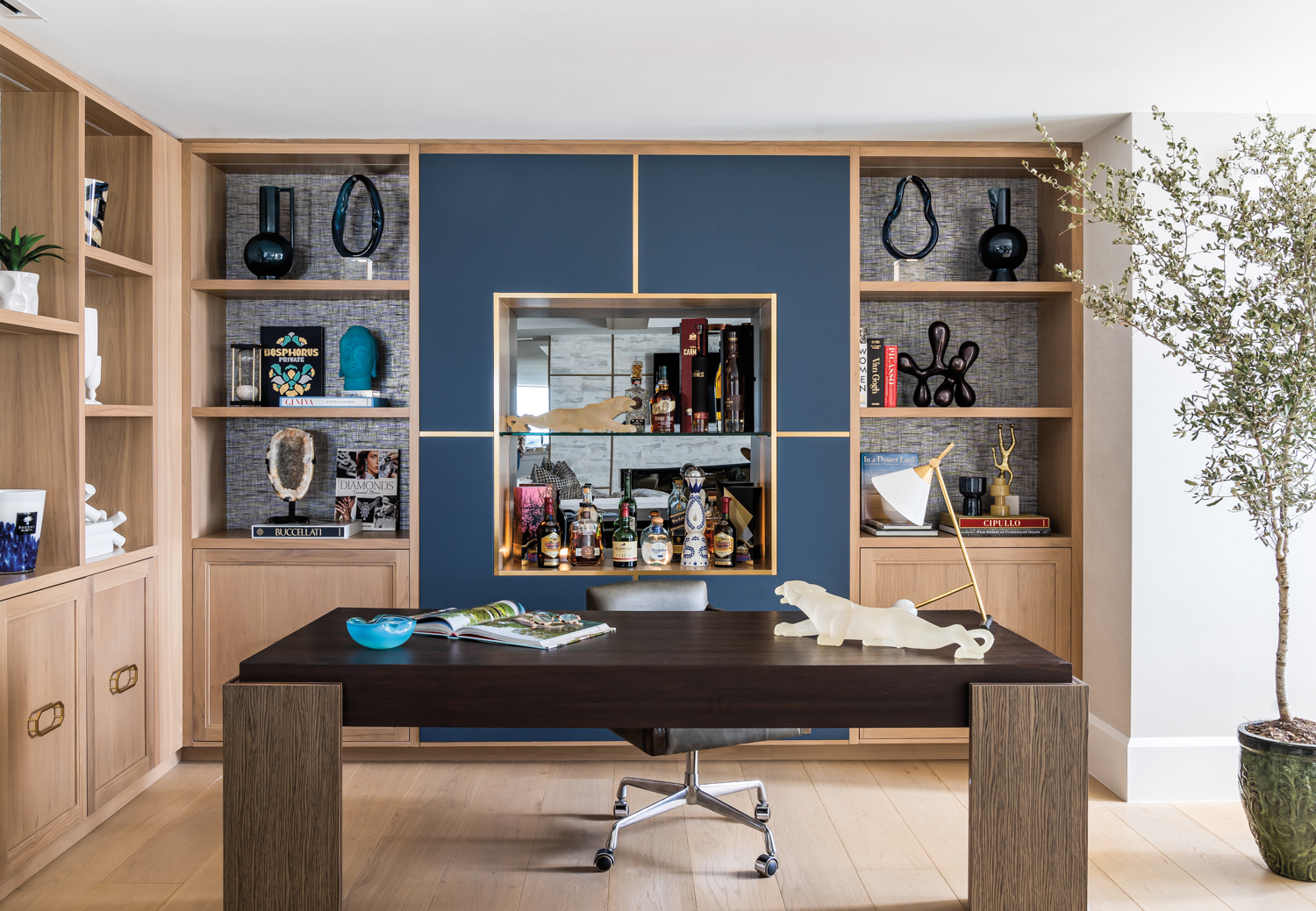 office with blue leather bar,...