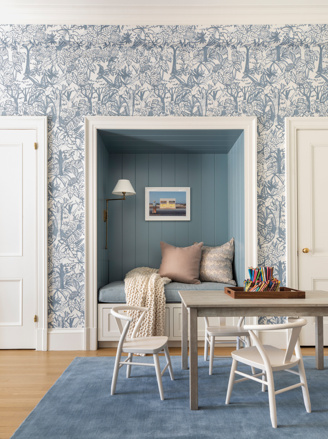 reading nook painted blue with...