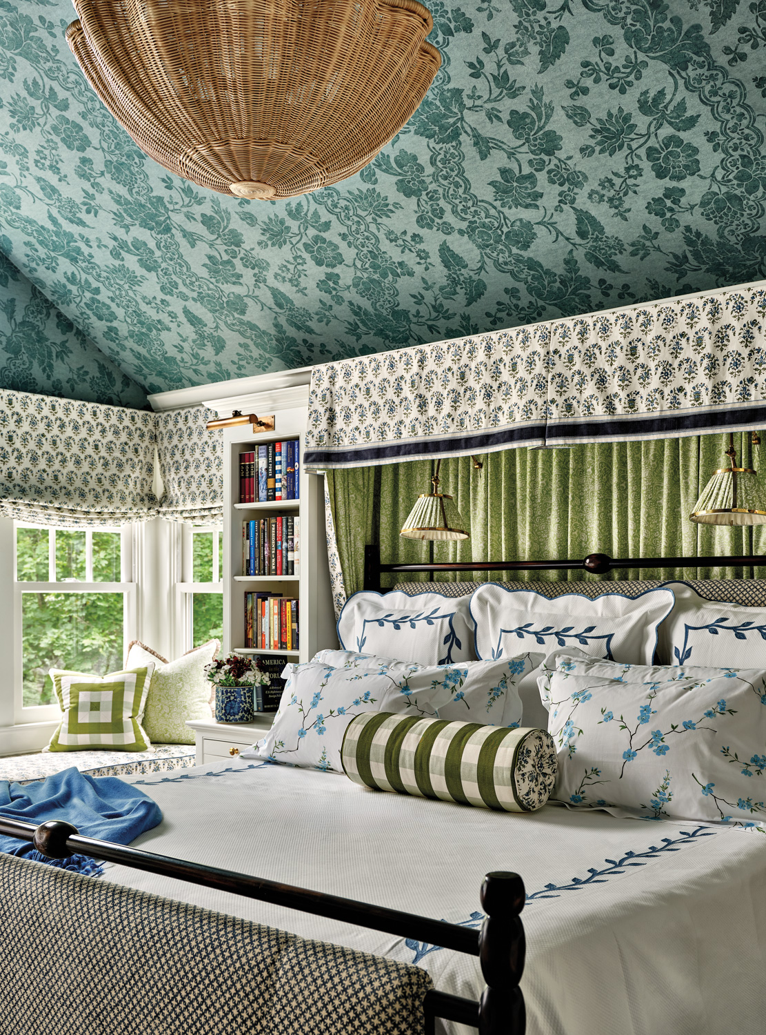 bedroom with blue floral wallpaper...