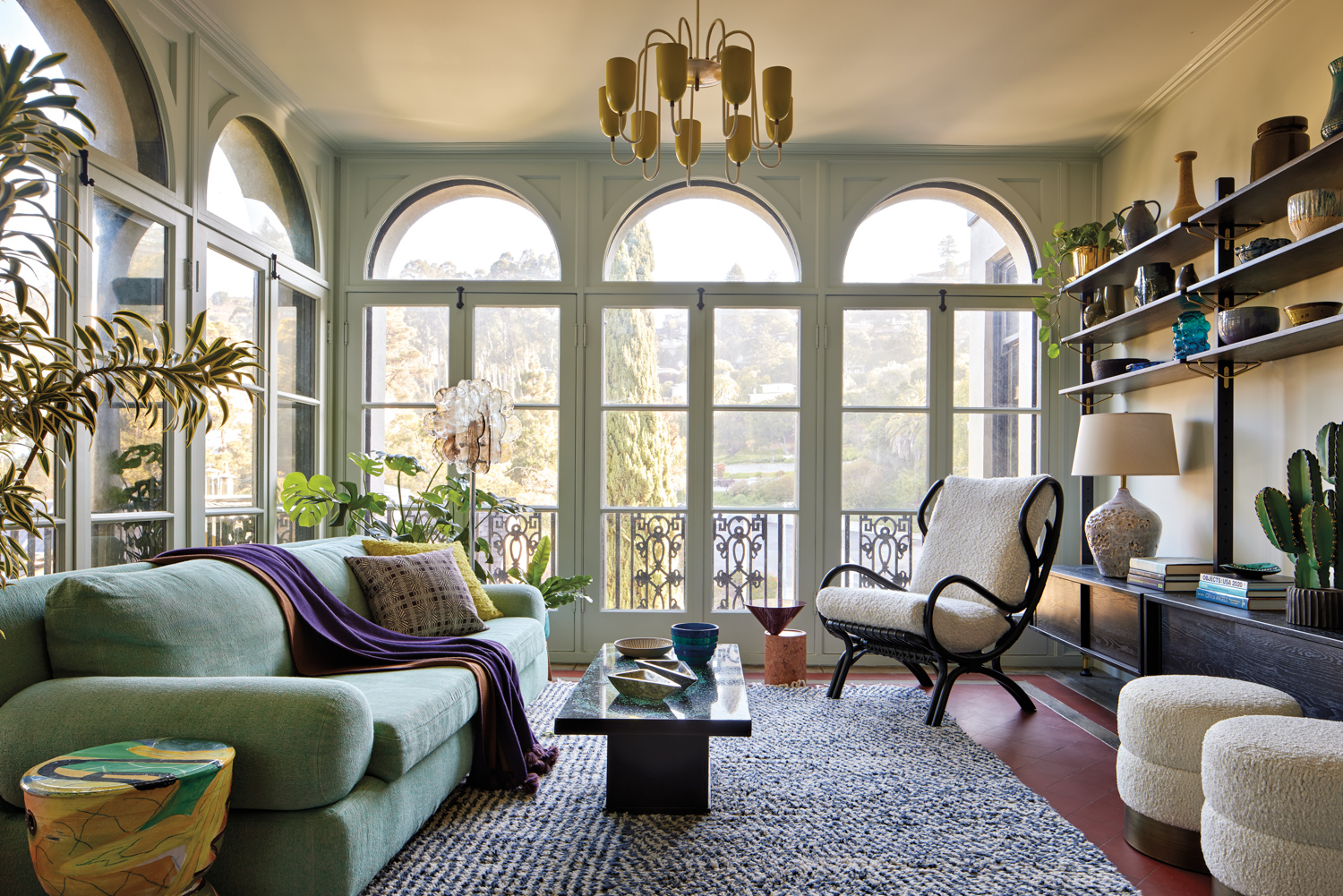 Sun room with large arched...