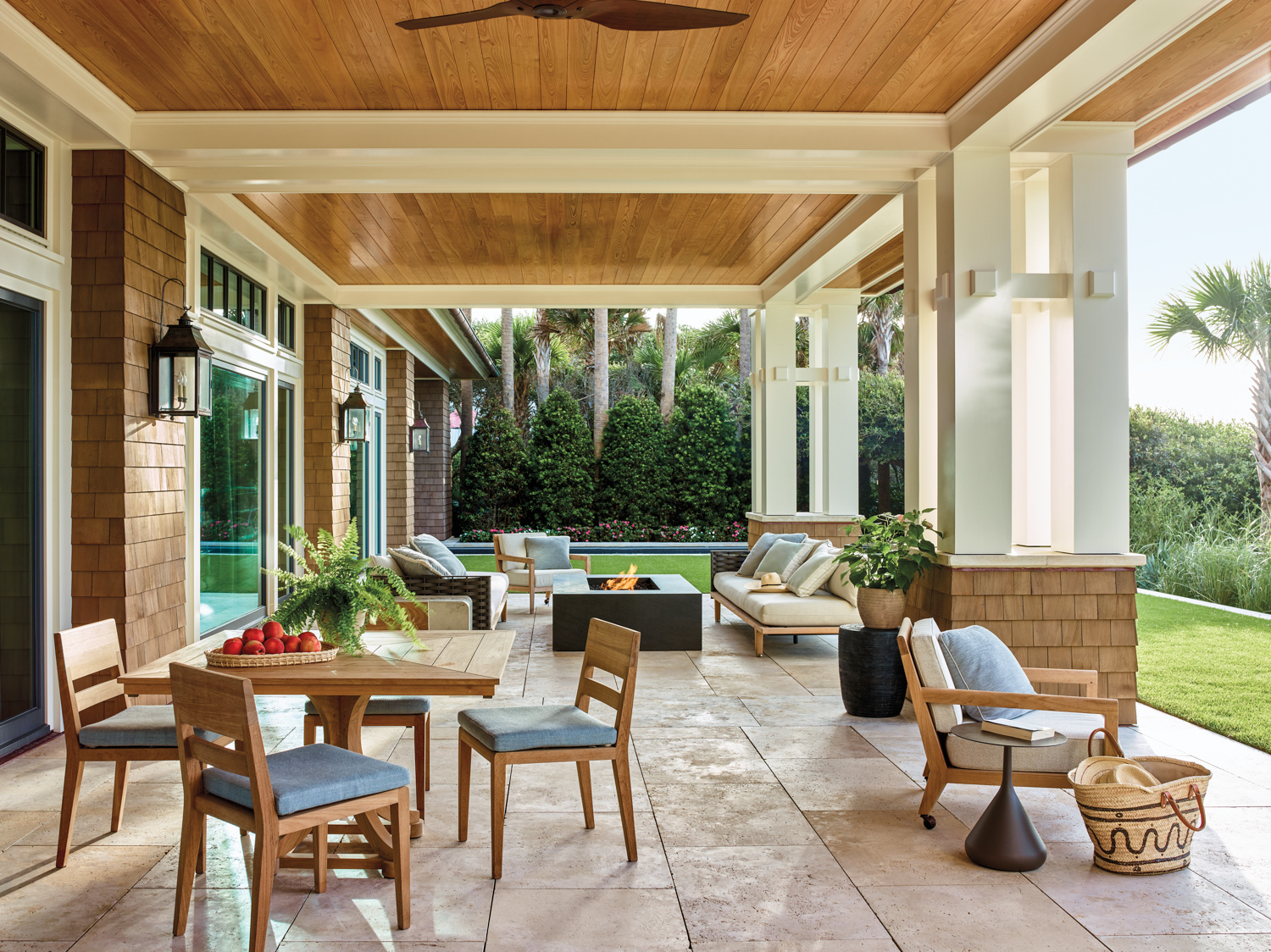 Covered patio featuring a wooden...