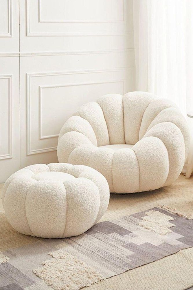 white puffy armchair with matching puffy ottoman from Maison&Objet 2023