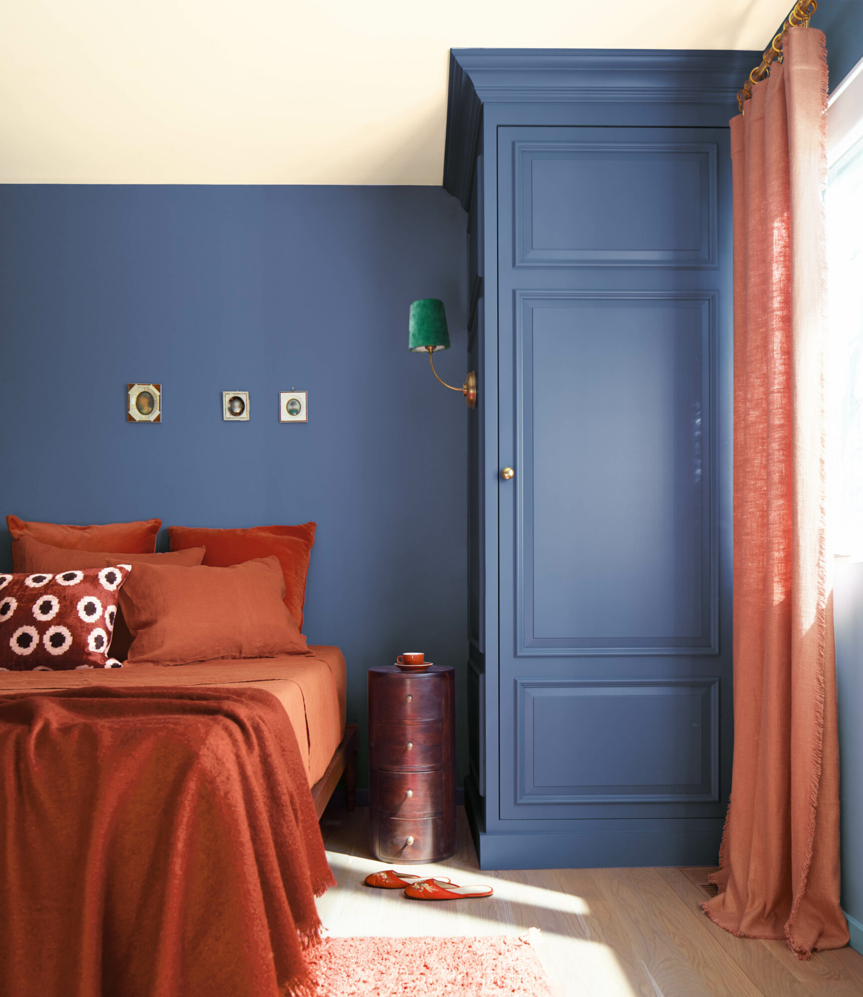 bedroom with drawers painted with Benjamin Moore Color of the year Blue Nova