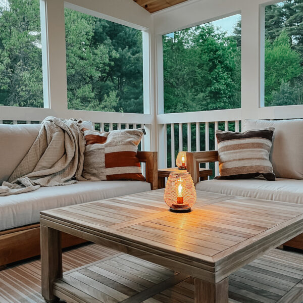 Chatsworth deep teak outdoor seating in cozy sunroom