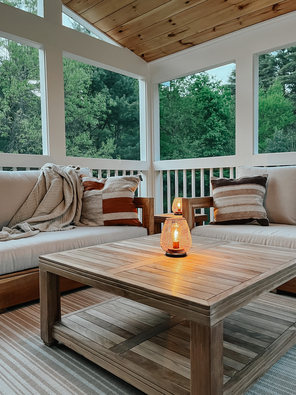 Chatsworth deep teak outdoor seating in cozy sunroom