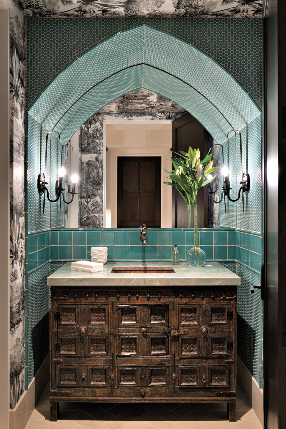 Powder room with a green...