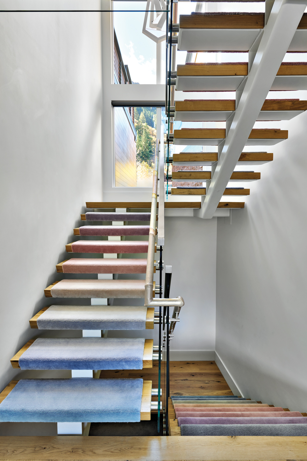 stairwell with carpeting in a...