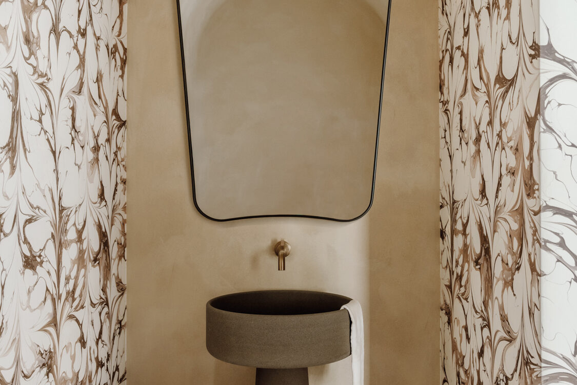 How This Earthy Powder Room Gives A New Meaning To Respite