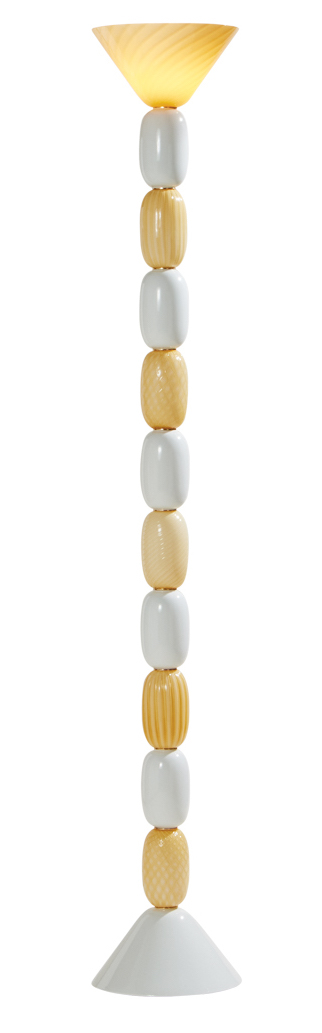 stack of white and gold beads that make up a lamp