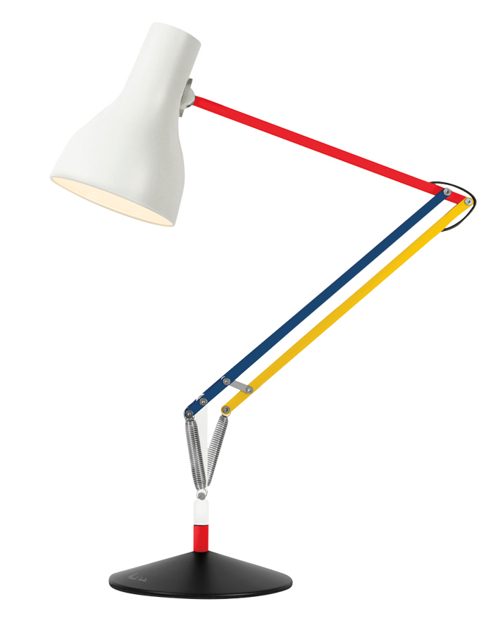 white lamp with red, blue and yellow stand
