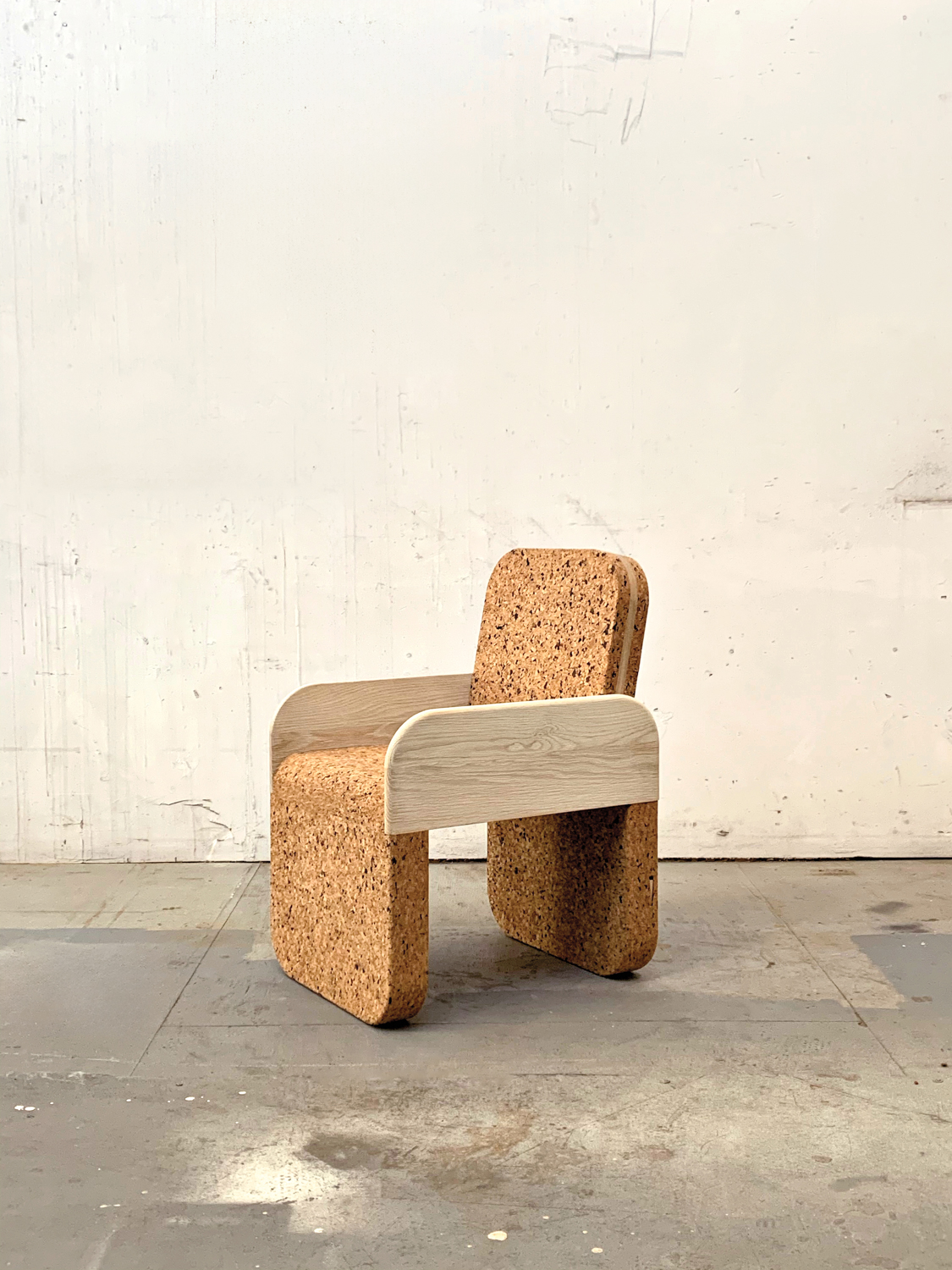 cork chair against neutral background