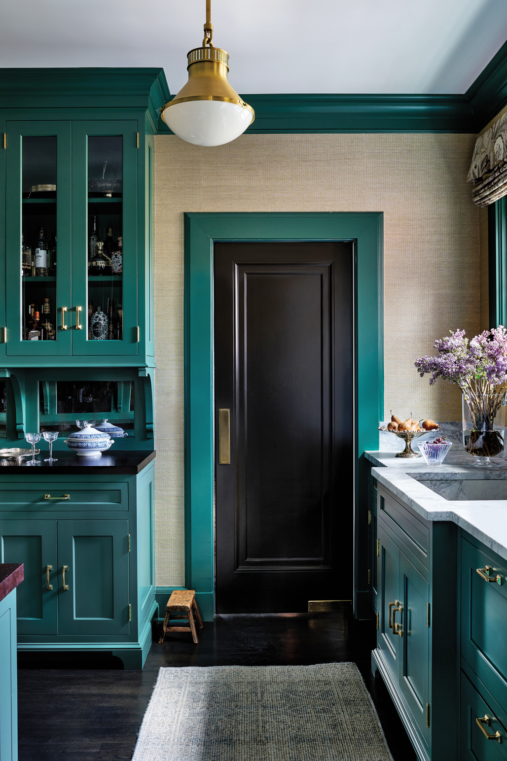pantry with bright green trim,...